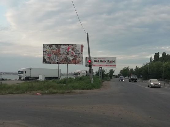 Фото рекламной плоскости по адресу Объездная дорога, с. Усатово, 14+500Б в стор пос. Кототвского
