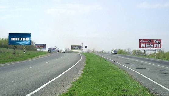 Фото рекламной плоскости по адресу р-н оптового овощного рынка и на въезде в г. Краматорск (направление на Краматорск)