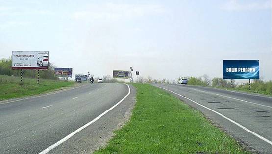 Фото рекламной плоскости по адресу р-н оптового овощного рынка и на въезде в г. Краматорск (направление на Краматорск)