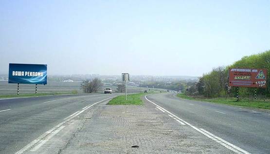 Фото рекламной плоскости по адресу р-н оптового овощного рынка и на въезде в г. Славянск (направление на Славянск)