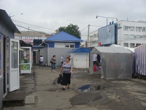 Фото рекламной плоскости по адресу Шевченка вул. (центральний ринок)