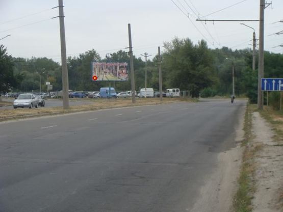 Фото рекламной плоскости по адресу Миру просп. (автостоянка)(в центр)