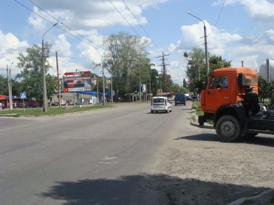 Фото рекламной плоскости по адресу М. Бірюзова вул.та  Ковпака вул. (в центр)на перехр.