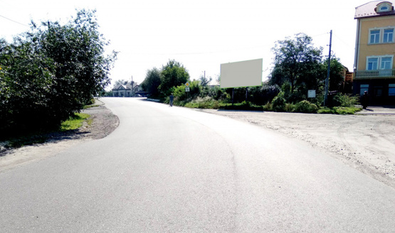 Фото рекламної площини за адресою вул. Равська, 8 ( зупинка маршрутного транспорту, в'їзд в центр із м.Рава-Руська/кордону) + жовта вітрозахисна люмінесцентна рамка