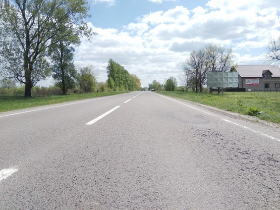 Фото рекламной плоскости по адресу с границы c Польшей (г.Рава-Русская) на г.Львов, г.Жовква, трасса Львов- Рава-Русская (М-09) + СТО