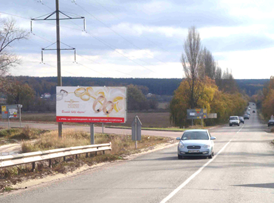 Фото рекламной плоскости по адресу выезд с Бучи на Ирпень ч-з Grand (стройка) стеклозаводская (перекрёсток с ул. Кирова, Буча)