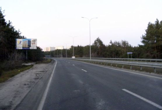 Фото рекламної площини за адресою Минский пр-т/1,2 км до перекрестка, направо на Н.Петривцы,Дымер,налево,на пл.Шевченко (В)