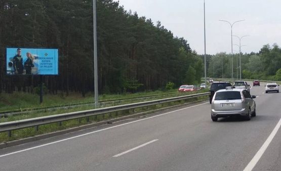 Фото рекламной плоскости по адресу Минский пр-т/ 2 км до перекрестка,направо на Н.Петривцы,Дымер,налево,на пл.Шевченко (В)