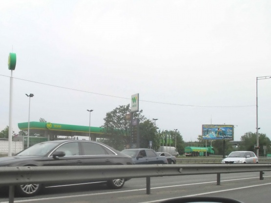 Фото рекламной плоскости по адресу Надднепрянское шоссе  (АЗС WOG)-из центра в стор. Конча Заспы