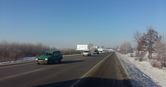 Фото рекламной плоскости по адресу Обїздна М-10, З.О. м. Львова, біля готеля Галіція в сторону Епіцентру