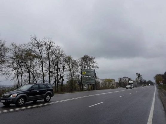 Фото рекламной плоскости по адресу Обїздна М-06, Підїзд до м.Львова, перед Дублянами в сторону Львова (верхній)