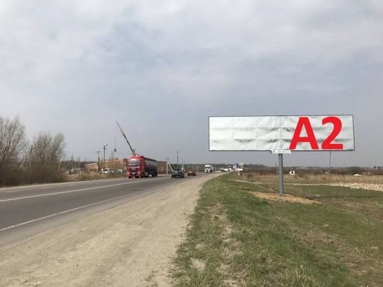 Фото рекламной плоскости по адресу Обїздна М-10, Західний обхід м. Львів, с.Скнилів в сторону МETRO (лівий)