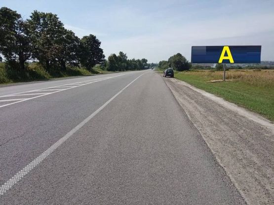 Фото рекламної площини за адресою М-06 Київ-Чоп, с.Підбірці в сторону Винник