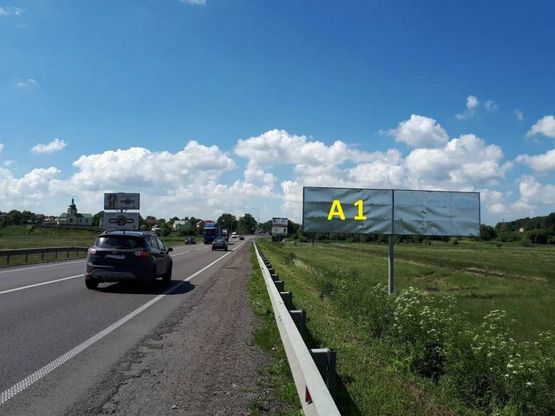 Фото рекламной плоскости по адресу Об'їзна М-06, Київ-Чоп, перед с.Гамаліївка після АЗС WOG в сторону Львова (лівий)