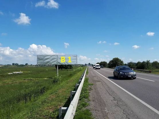 Фото рекламной плоскости по адресу Об'їзна М-06, Київ-Чоп, перед с.Гамаліївка перед АЗС WOG в сторону Київа (правий)