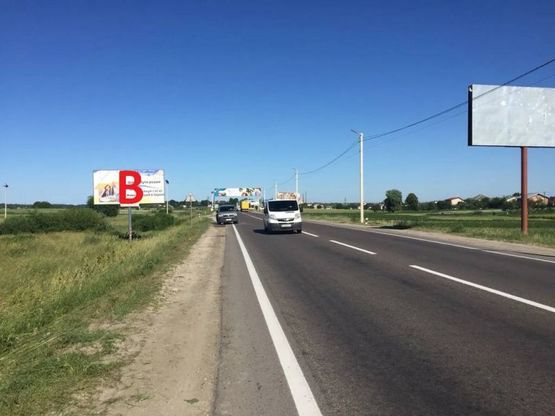 Фото рекламної площини за адресою Обїздна М-10, Львів - Краківець, с. Підрясне біля Ресторану Смерековий Двір рух в сторону Львова
