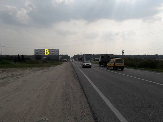 Фото рекламної площини за адресою М-10 Західний обхід м. Львова, в сторону с. Рудно та м. Львів до Fujikra (навпроти АЗС SOCAR)