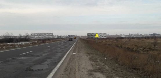 Фото рекламной плоскости по адресу М-09, Тернопіль-Львів-Рава-Руська, за с. Великі Грибовичі у напрямку до с. Куликів та м. Жовква