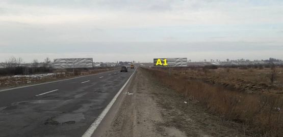 Фото рекламної площини за адресою М-09, Тернопіль-Львів-Рава-Руська, за с. Великі Грибовичі у напрямку до с. Куликів та м. Жовква (лівий)