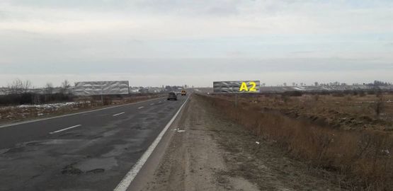 Фото рекламної площини за адресою М-09, Тернопіль-Львів-Рава-Руська, за с. Великі Грибовичі у напрямку до с. Куликів та м. Жовква (правий)