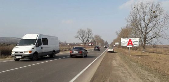 Фото рекламної площини за адресою М-09, Тернопіль-Львів-Рава-Руська, Зі Львова в напрямку м. Жовква, після села Малехів