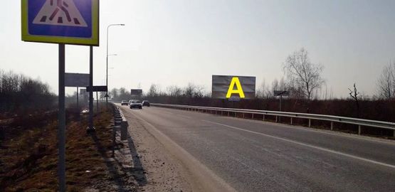 Фото рекламної площини за адресою Т-14-16 Львів-Пустомити-Меденичі, рух з м. Львів в сторону м. Пустомити виїзд із с. Наварія