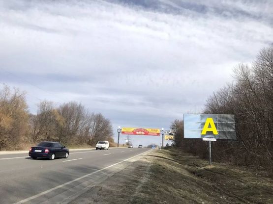 Фото рекламної площини за адресою М-06 Київ-Чоп, Обїздна М-06, Київ-Чоп, за с. Чишки в сторону Виниик