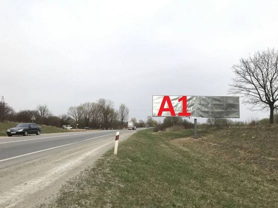 Фото рекламної площини за адресою М-06 Київ-Чоп, за поворотом на Тернопіль і в сторону Києва (лівий)