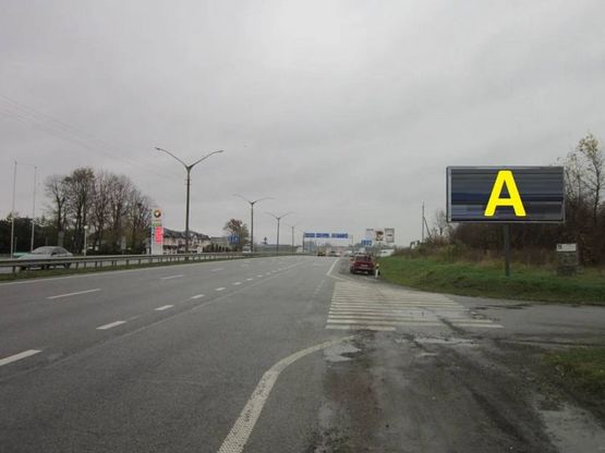 Фото рекламной плоскости по адресу Траса М-06 Київ-Чоп, в напрямку до м. Львів в межах с. Солонка