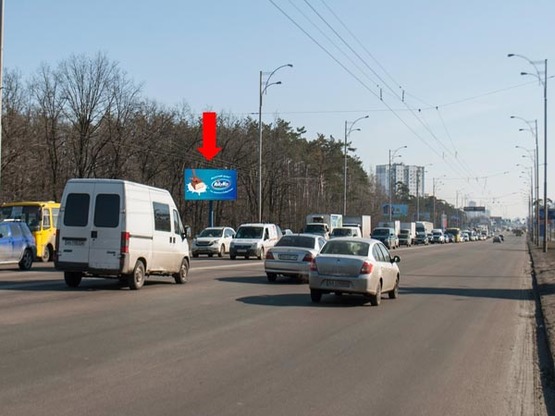 Фото рекламной плоскости по адресу ул. Братиславская ( рынком "Юность" и супермаркетом "Эпицентр") (В)