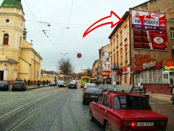 Фото рекламной плоскости по адресу Шевченка вул., 8 (верхній)