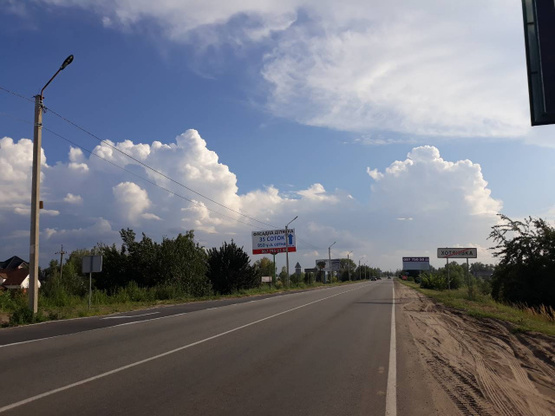 Фото рекламної площини за адресою трасса Р69 с.Хотяновка,магазин Фора, выезд из села, направление в Вышгород,Киев