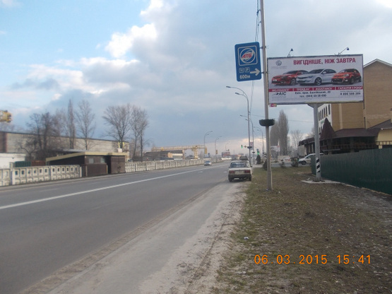 Фото рекламної площини за адресою Набережная 250 м. перед поворотом на ул. Шевченко, направл. Киев