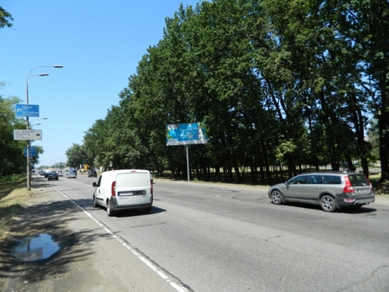 Фото рекламной плоскости по адресу Окружная дорога / ул. Дмирия Луценка, напротив ТЦ "Аракс", "Фокстрот" - в напр. пр. Победы