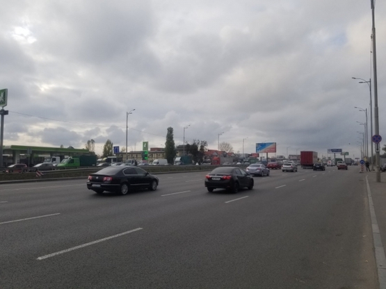 Фото рекламной плоскости по адресу Кольцевая дорога, напр. ул. Зодчих, 18 - ("Опалковый Замок", ав-н "ТOYOTA") - напр. на пр. Победы