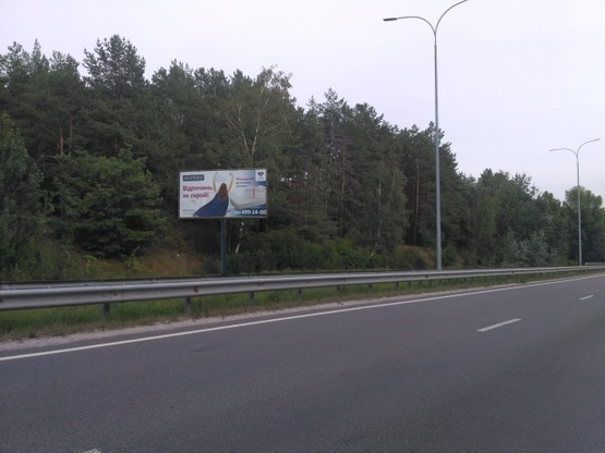 Фото рекламної площини за адресою ул. Богатырская в сторону Оболони, Вышгород, трасса в сторону Межигорья, зоопарк "12 месяцев"