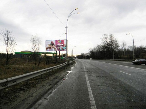 Фото рекламной плоскости по адресу Бориспольское шоссе, напротив ресторана "Козацький стан" (черта города, стелла Киева, с/м Новая Линия). 900 м до Харьковской площади. электроопора № 16 (в районе 18 км 700 м), в сторону Борисполя