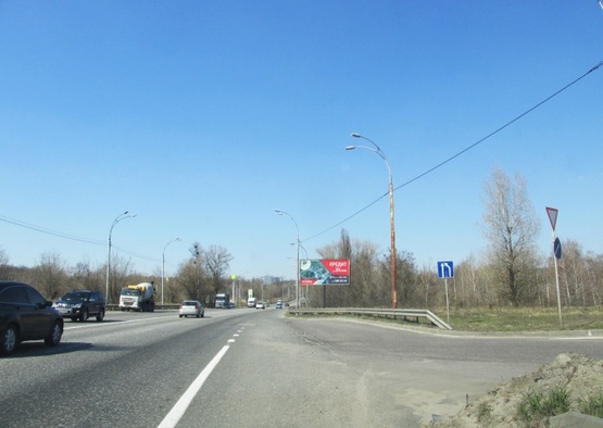 Фото рекламної площини за адресою ул. Заболотного, выезд из заправки WOG, навпротив, в сторону ул. Ак. Глушкова. ТЦ АРТМОЛ, Гипермаркеты ДОМОСФЕРА и АТМОСФЕРА