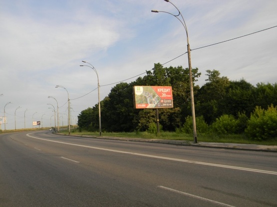 Фото рекламной плоскости по адресу ул. Заболотного, 1200 м от заправки ANP, в сторону ул. Ак. Глушкова. ТЦ АРТМОЛ, Гипермаркеты ДОМОСФЕРА и АТМОСФЕРА