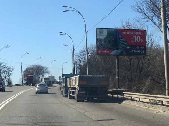 Фото рекламной плоскости по адресу ул. Заболотного, 1330 м от заправки ANP, в сторону ул. Ак. Глушкова. ТЦ АРТМОЛ, Гипермаркеты ДОМОСФЕРА и АТМОСФЕРА