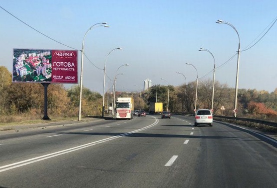 Фото рекламной плоскости по адресу ул. Заболотного, 1330 м от заправки ANP, в сторону Столичного шоссе. ТЦ АРТМОЛ, Гипермаркеты ДОМОСФЕРА и АТМОСФЕРА