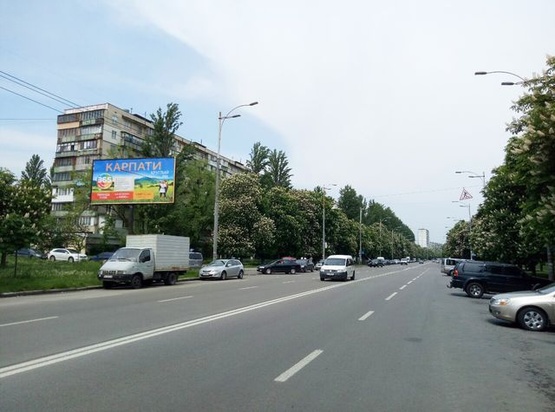 Фото рекламной плоскости по адресу Бульвар Ромен Роллана, 3 (остановка). В сторону ул. Я.Колоса