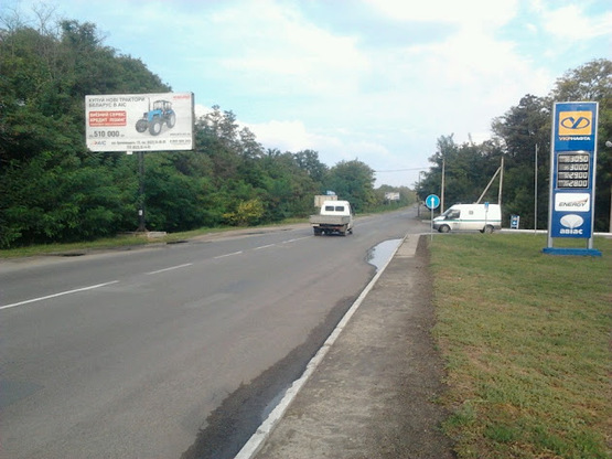 Фото рекламной плоскости по адресу ул Родимцева, выезд на Кр Рог