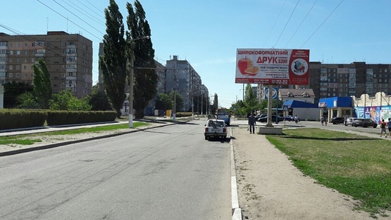 Фото рекламной плоскости по адресу ул. Жадова, АТБ