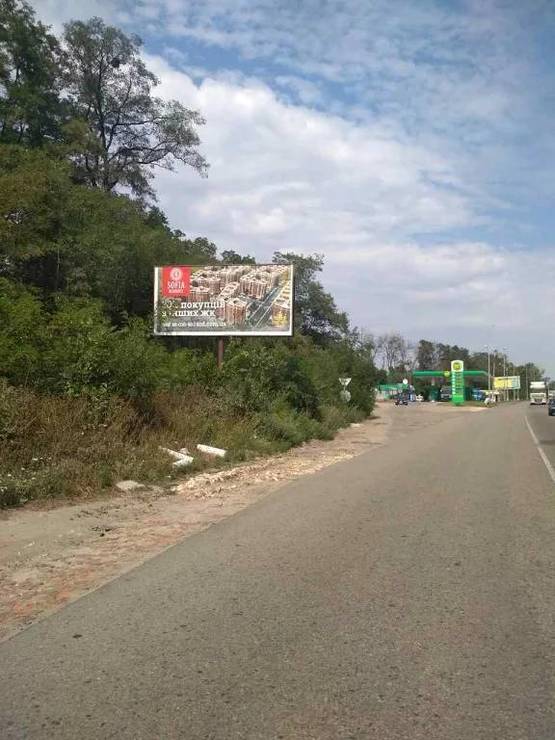 Фото рекламной плоскости по адресу В.Почтовая, а/д М-05 Киев-Одесса, за заправкой WOG