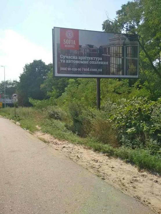 Фото рекламної площини за адресою В.Почтовая, а/д М-05 Киев-Одесса, за заправкой WOG