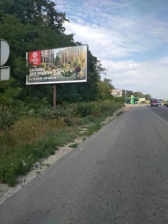 Фото рекламной плоскости по адресу В.Почтовая, а/д М-05 Киев-Одесса, за заправкой WOG