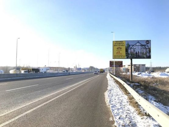 Фото рекламної площини за адресою В.Почтовая, a/д М-05 Киев-Одесса , после АЗС AMIC ENERGY