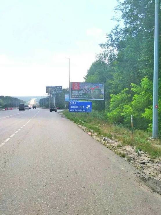 Фото рекламной плоскости по адресу В.Почтовая, а/д М-05 Киев-Одесса, за заправкой WOG