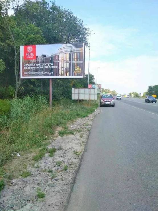 Фото рекламної площини за адресою В.Почтовая, а/д М-05 Киев-Одесса, за заправкой WOG
